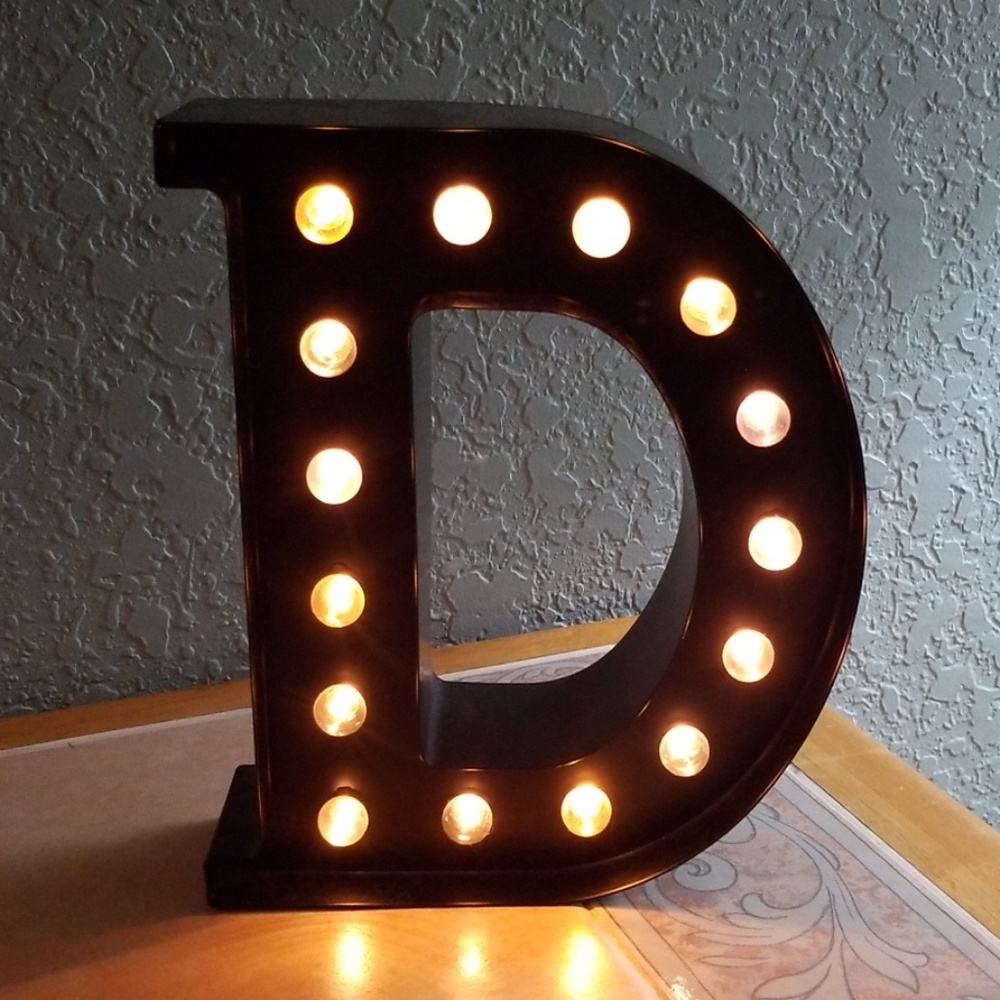 Lighted letter D